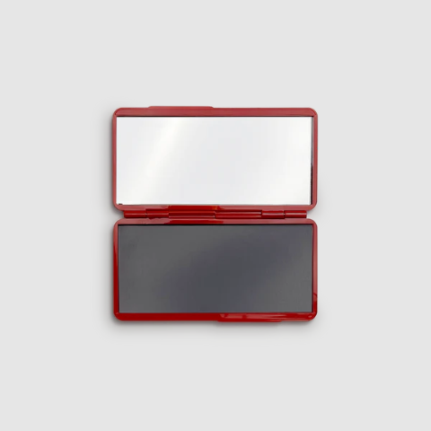 Mirrored Compact in Fast Car